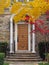 Home with elegant portico entrance and fall colors