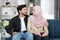 Home, family and relationship concept. Close up portrait of happy smiling arabian couple, handsome bearded man and