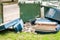 Home furniture thrown out in the junk near street garbage cans in the city after disaster