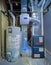 A home Goodman high efficiency furnace with Bradford White Residential gas water heater &