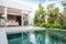 Home or house building Exterior and interior design showing tropical pool villa with green garden and bedroom