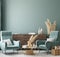 Home interior mock-up with turquoise armchairs, table and pampas