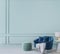 Home interior mockup with blue armchair, marble table and tiffany blue wall decor in living room