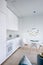 Home interior with white kitchenette