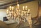 Home interiors Chandelier on ceiling. Vintage chandelier