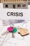 Home keys, euro and inscription crisis on housing plan. Real estate crisis caused by coronavirus. Small house under construction