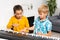 Home lesson on music for kids on the piano. The idea of activities for the child at home during quarantine. Music