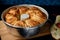 Home made artisanal coconut bread on a reflective dark glass background