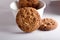 Home made biscuits with peanuts on top of it and sugar crystals in white background,home made buscuits with slelctive focus