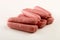 Home made british pork sausages on bright background