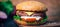 Home made Burger cheeseburger with beef on a wooden background. Classic home made Burger. Close up, copy space