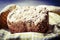 Home made cereal bread in yellow cloth on wooden table