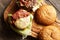 Home made cheeseburgers on wooden table