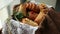 Home made cookies and buns in bread basket on a brown background. Lifestyle