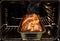 Home made freshly baked traditional romanian Christmas Xmas sponge cake cozonac still in baking form in front of the oven.