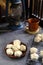 Home made of Malaysia traditional Coconut Cream Cookies or & x27;Kuih Bangkit& x27; on the table over dark background.