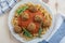 Home made pasta with vegan meatballs on a plate
