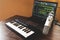 Home music studio: microphone, midi keyboard, laptop