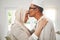 Home, Muslim elderly couple and forehead kiss, music slow dancing and bond for love, trust and care with kindness