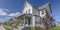 Home with porch and picket fence in Daybreak Utah