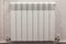 Home radiator heater on white wall