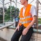 Home repair, building restructuring. Construction worker with reflective safety jacket