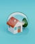 Home safety. A model home protected under a glass dome on blue background. Safety and insurance concept. 3d illustration