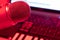 Home Studio with Condenser Professional Microphone and piano keyboard. Laptop in red light