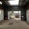 Home suburban countryside modern car and ATV double garage interior with wooden shelf tools and equipment stuff storage