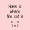 Home is where the cat is handwritten lettering with a cute cate ears and nose isolated on pink background  illustration