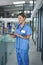Home is where my scrubs fit and the wifi connects. an attractive young nurse standing and using a digital tablet in the