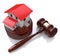Home on white background and court gavel (done in 3d)
