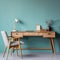 Home workplace with wooden drawer writing desk and grey fabric chair near turquoise wall with copy space