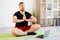 home yoga meditating man online training harmony