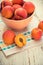 Homegrown apricots on vintage white wooden table