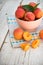 Homegrown apricots on vintage white wooden table