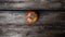 Homegrown orange squash pumpkin placed on rustic wooden boards