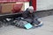 Homeless beggar in a street in London