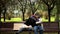 A homeless couple, a man and woman on a bench in a city Park