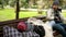 A homeless couple, a man and woman having fun sitting in a Park bench. humor