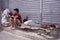 Homeless filipino people sleeping at the street