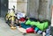 Homeless man with bicycle and sleeping bag asleep in doorway in South Kennsington London UK 1-10-2018