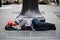 Homeless man sleeping on the street in Paris