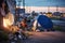 Homeless tent camp and garbage along the road in a modern evening city