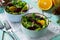 Homemade appetizer on a festive Christmas table. Salad with beets, orange, arugula and pine nuts