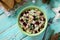 Homemade appetizer on a festive Christmas table. Salad with beets, Peking cabbage, meat and beans.