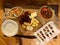 Homemade Appetizer Table with Cheese Plate, Hummus, Fig Canepe with Tomato Salad.