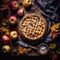 A Homemade apple pies on rustic background and apples, classic dessert for Thanksgiving, top view