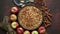 Homemade Apple tart pie with fresh fruits and cinnamon sticks on rusty background