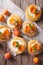 Homemade apricot cookies with a delicate cream vertical top view
